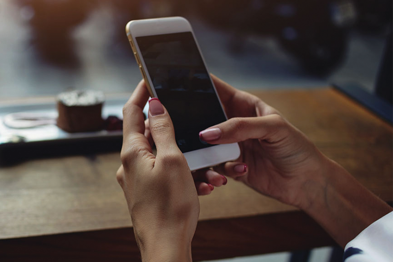 Woman holding phone